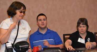 Three blind members present a seminar at convention.
